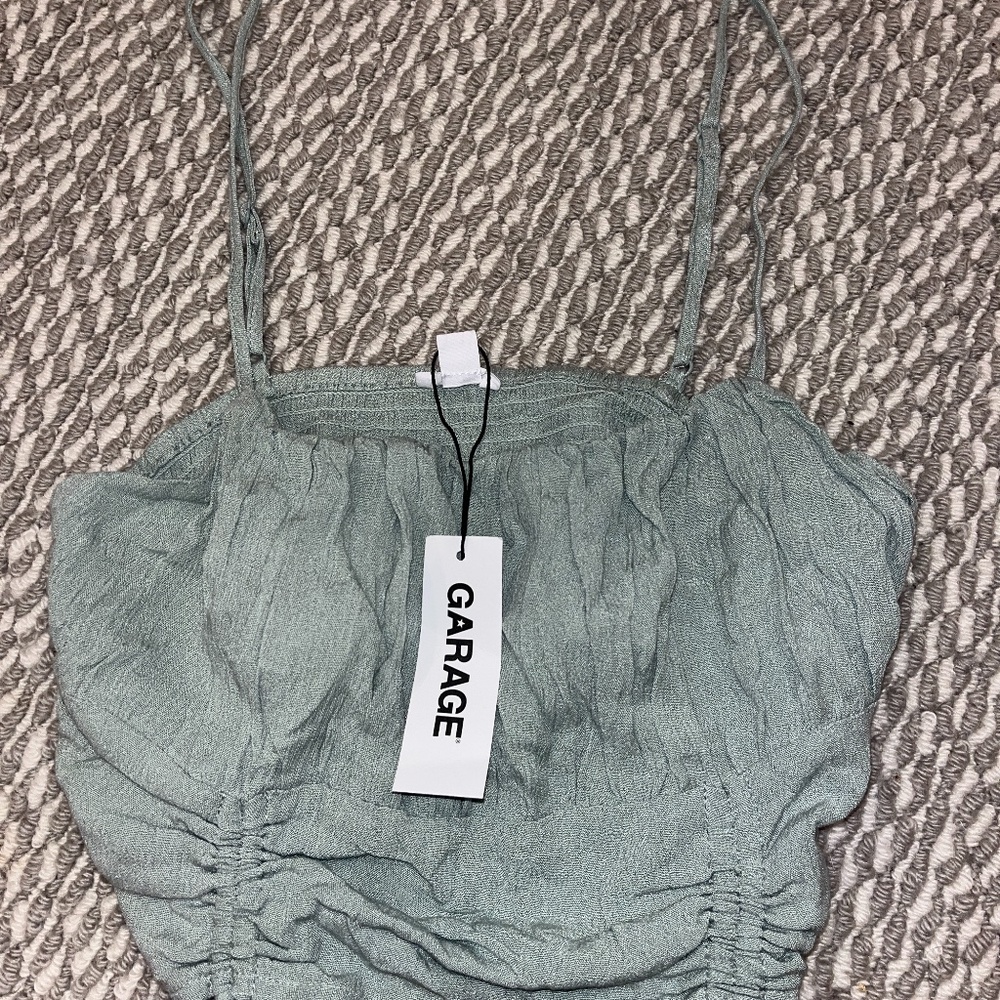 green tank top
